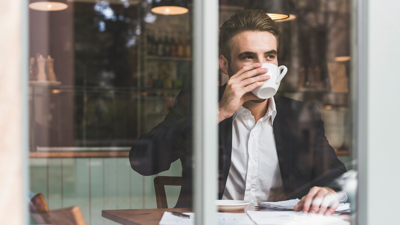 man drinking coffee
