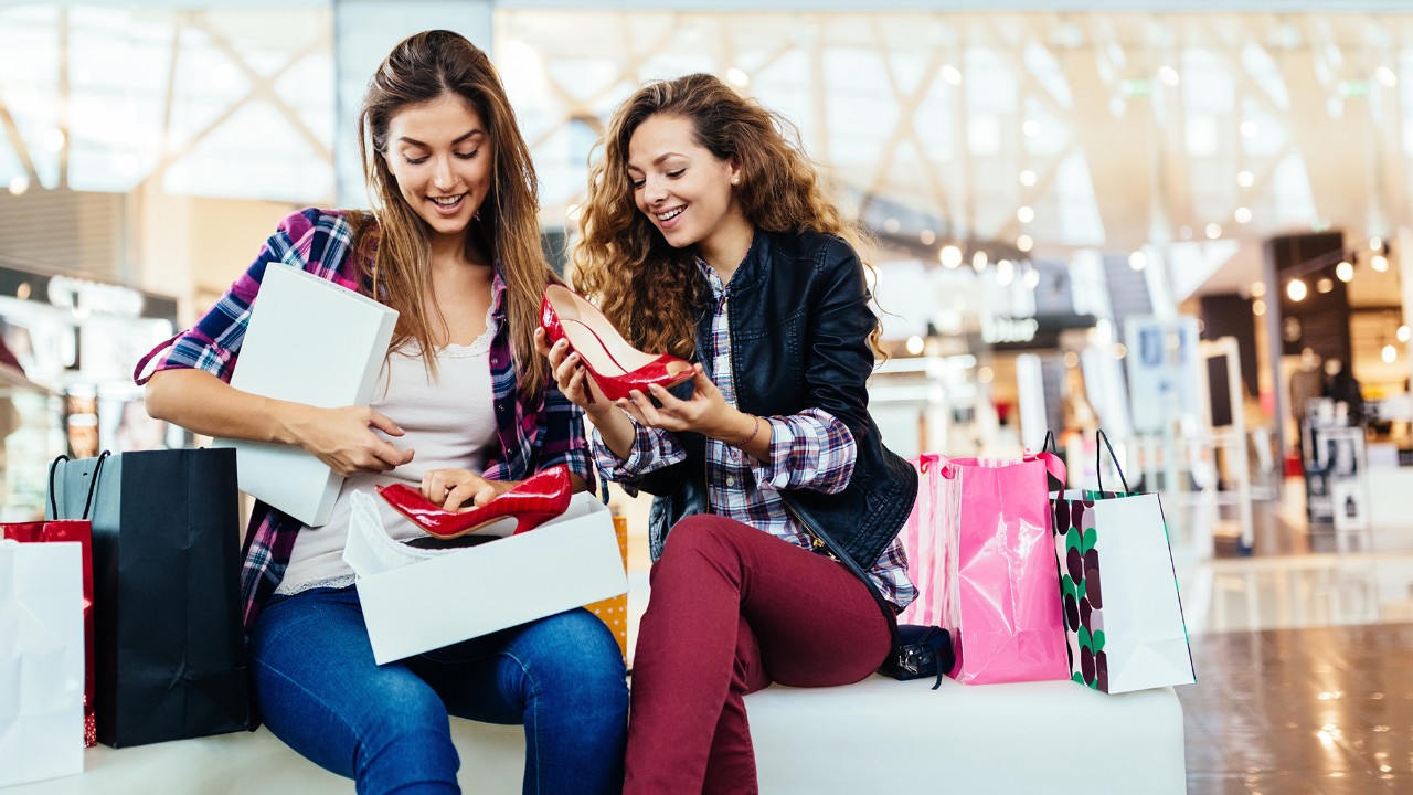 Two women looking at the shoes