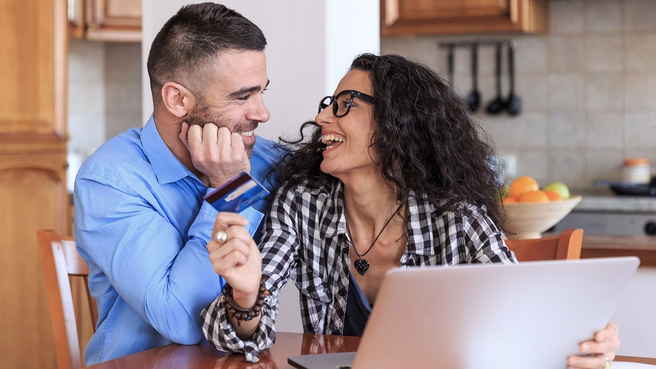 couple smiling kitchen