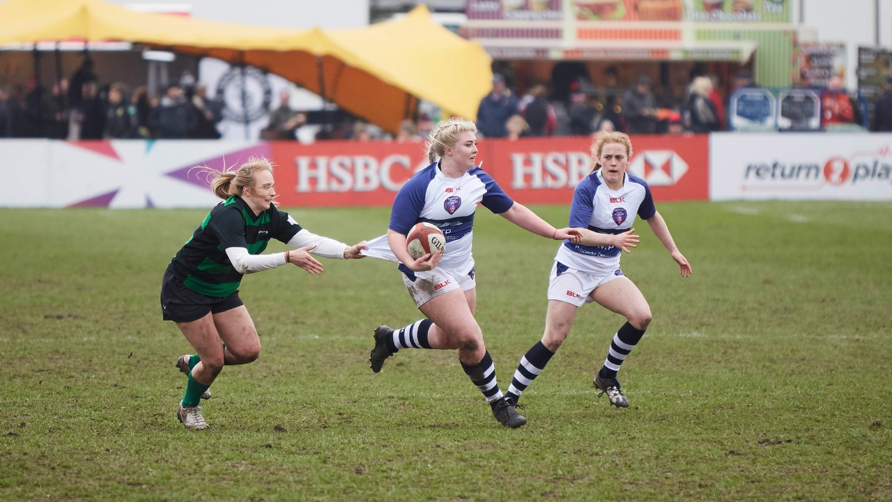 Group of girls playing rugby