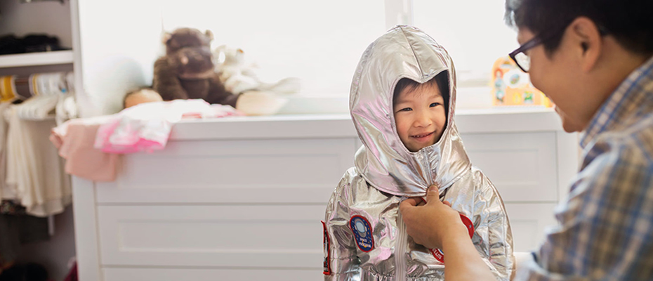 the boy in the silver coat